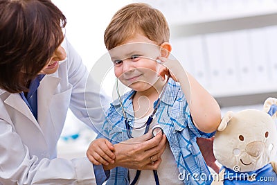 Doctor examining child Stock Photo