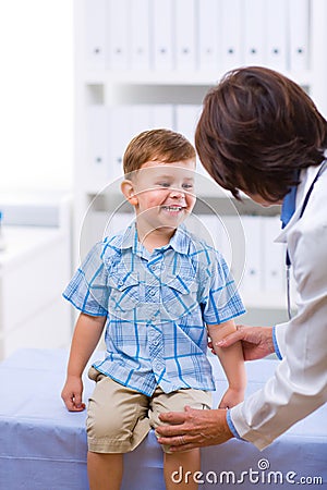 Doctor examining child Stock Photo