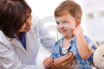 Doctor examining child Stock Photo