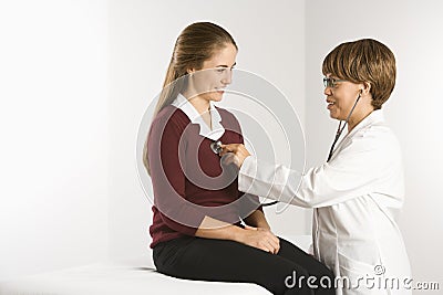 Doctor examining patient. Stock Photo