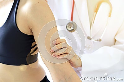 Doctor examining patient, Sport exercise injuries. Stock Photo