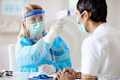 Coronavirus outbreak. Doctor and covid-19 patient Stock Photo