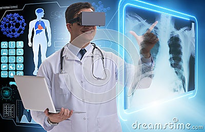 The doctor examining x-ray images using virtual reality glasses Stock Photo