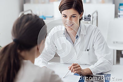 Doctor explaining diagnosis to the patient Stock Photo