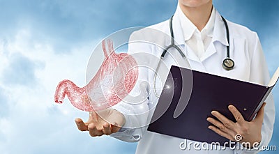 Doctor gastroenterologist shows the stomach . Stock Photo