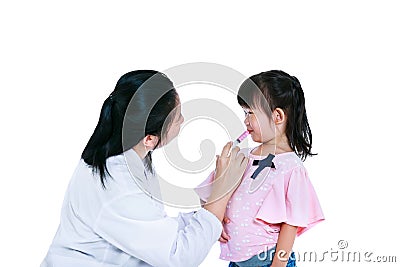 Doctor giving child medication by syringe. Isolated on white background. Stock Photo