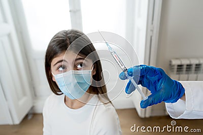 Doctor giving COVID-19 Vaccine to a patient at the clinic hospital. First safe and effective coronavirus Vaccine, human clinical t Stock Photo