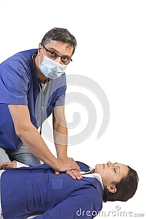 Doctor giving first aid to female pacient Stock Photo