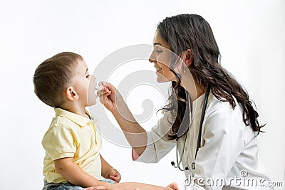 Doctor giving remedy to kid Stock Photo