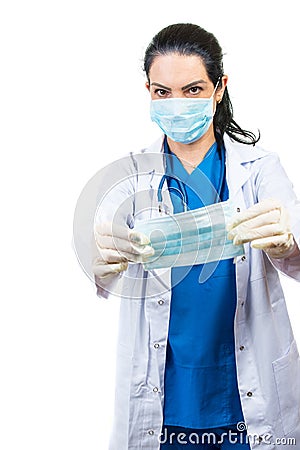 Doctor giving you surgical protective mask Stock Photo