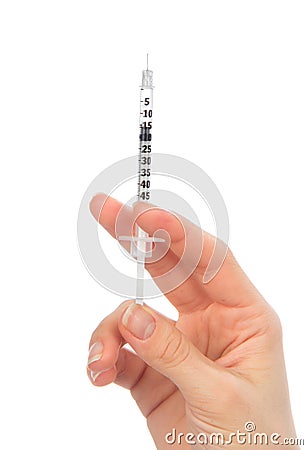 Doctor hand with medical insulin syringe in hand Stock Photo