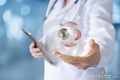 Doctor in hand shows eye Stock Photo