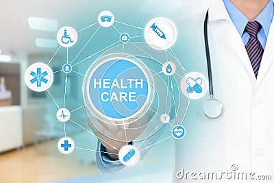 Doctor hand touching HEALTHCARE word on virtual screen Stock Photo