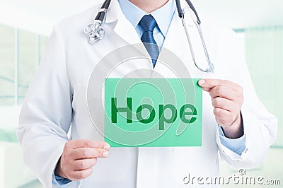 Doctor hands holding paper with hope text Stock Photo