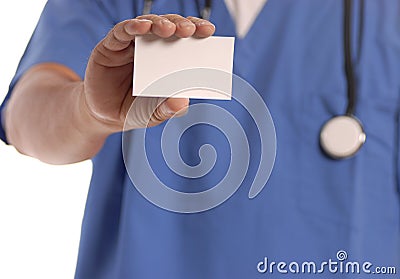 Doctor holding blank card Stock Photo