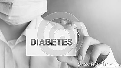 Doctor holding a card with Diabetes, Medical healthcare concept Stock Photo