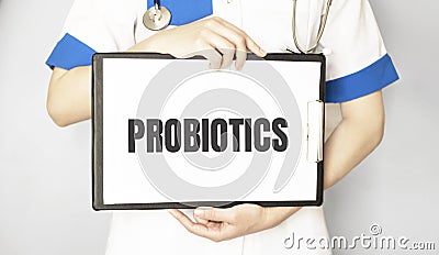 Doctor holding a card with text PROBIOTICS, medical concept Stock Photo