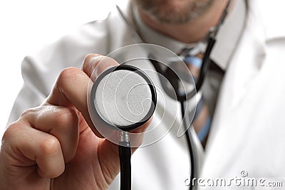 Doctor holding stethoscope Stock Photo