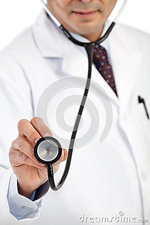 Doctor holding stethoscope Stock Photo