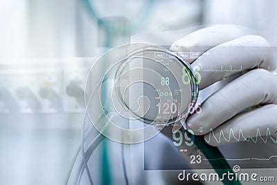 Doctor holding a stethoscope ,focus on the stethoscope Stock Photo