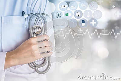 Doctor holding stethoscope in hand with modern medical technology background Stock Photo