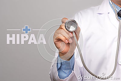 Doctor holding a stethoscope and word Stock Photo