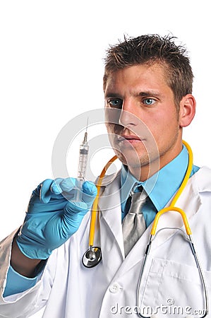 Doctor holding syringe Stock Photo