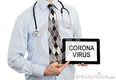 Doctor holding tablet Stock Photo