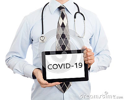 Doctor holding tablet Stock Photo