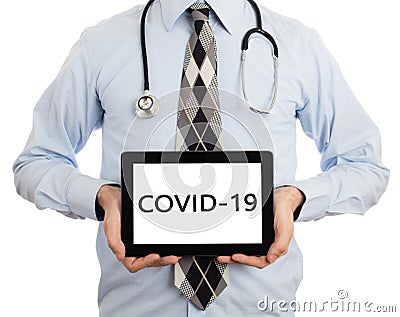 Doctor holding tablet Stock Photo