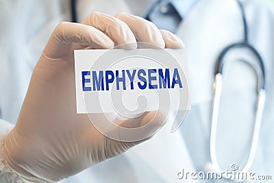 Doctor holding a paper card with text EMPHYSEMA, medical concept Stock Photo