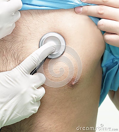 Doctor listens to a patient Stock Photo