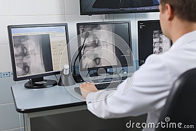 Doctor looking at the computer monitor Stock Photo