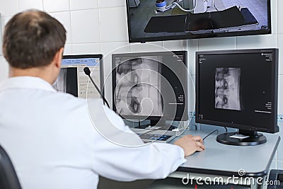 Doctor looking at the computer monitor Stock Photo