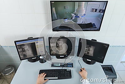 Doctor looking at the computer monitor Stock Photo