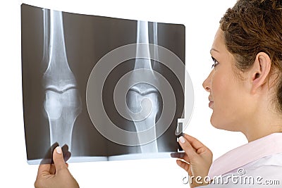 Doctor looking at x-ray Stock Photo