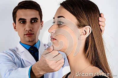 Examination of plastic surgery doctor, patient and consultation Stock Photo