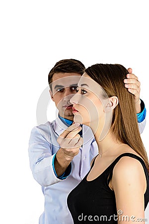 Plastic surgery doctor, patient inspection and consultation Stock Photo