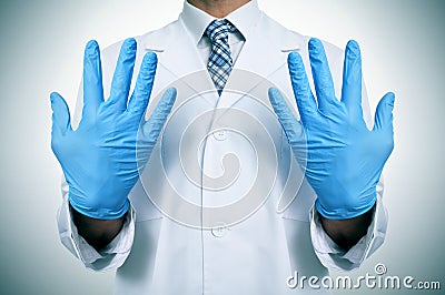 A doctor with medical gloves Stock Photo
