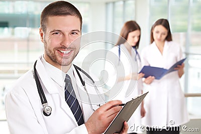 Doctor with nurses Stock Photo