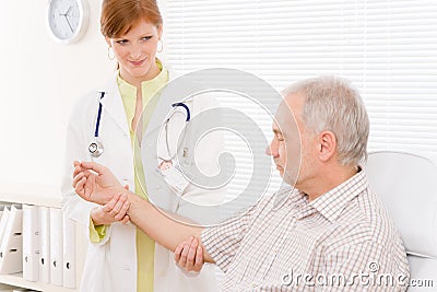 Doctor office - female physician examine patient Stock Photo