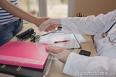 Doctor and patient at office. medicine, health care and people concept Stock Photo