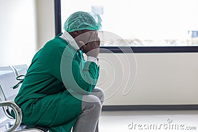 Doctor or Patients sitting on Chair have depression. Man patient in a hospital is discouraged Stock Photo