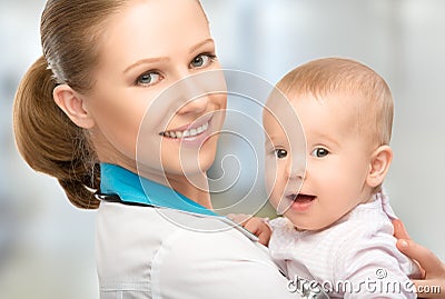 Doctor pediatrician and patient happy child baby Stock Photo