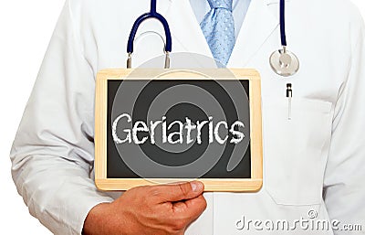 Doctor with Geriatrics chalkboard Stock Photo