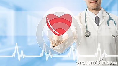 Doctor pointing at heart icon on blue background Editorial Stock Photo