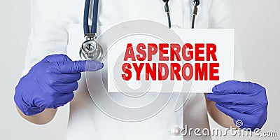 The doctor points his finger at a sign that says - ASPERGER SYNDROME Stock Photo