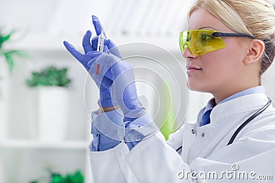 Doctor preparing an injection Stock Photo