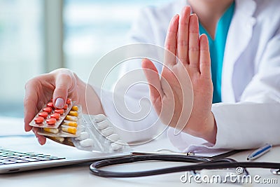 The doctor with prescribed medicines in medical concept Stock Photo