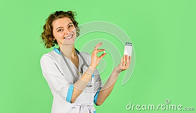 Doctor prescribing medicine in Hospital. give instruction. how to take pills correctly. pill in doctor hand. hospital Stock Photo